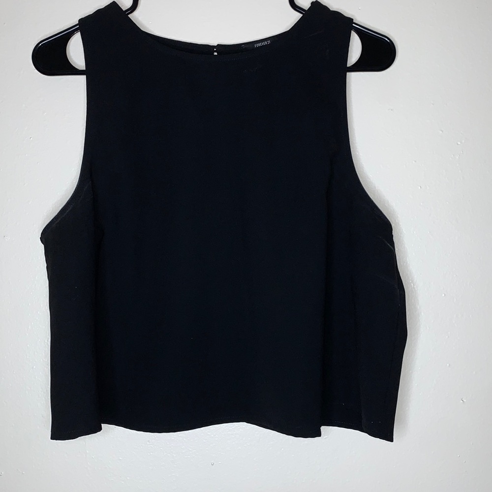 Sleeveless black blouse